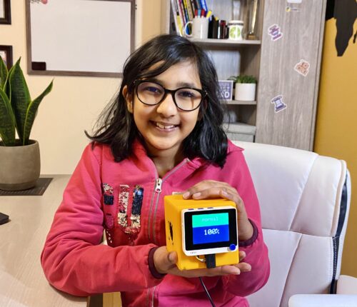 A young person and their home-made gas leak detector.